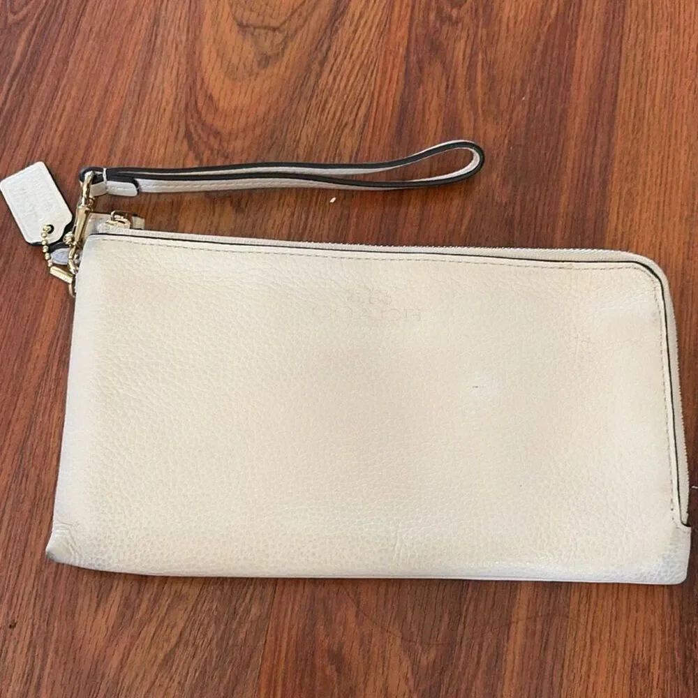 Coach pebbled leather large wristlet wallet cream beige